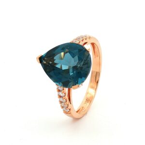 Anillo Diamantes y Topacio London Blue en Oro Amarillo