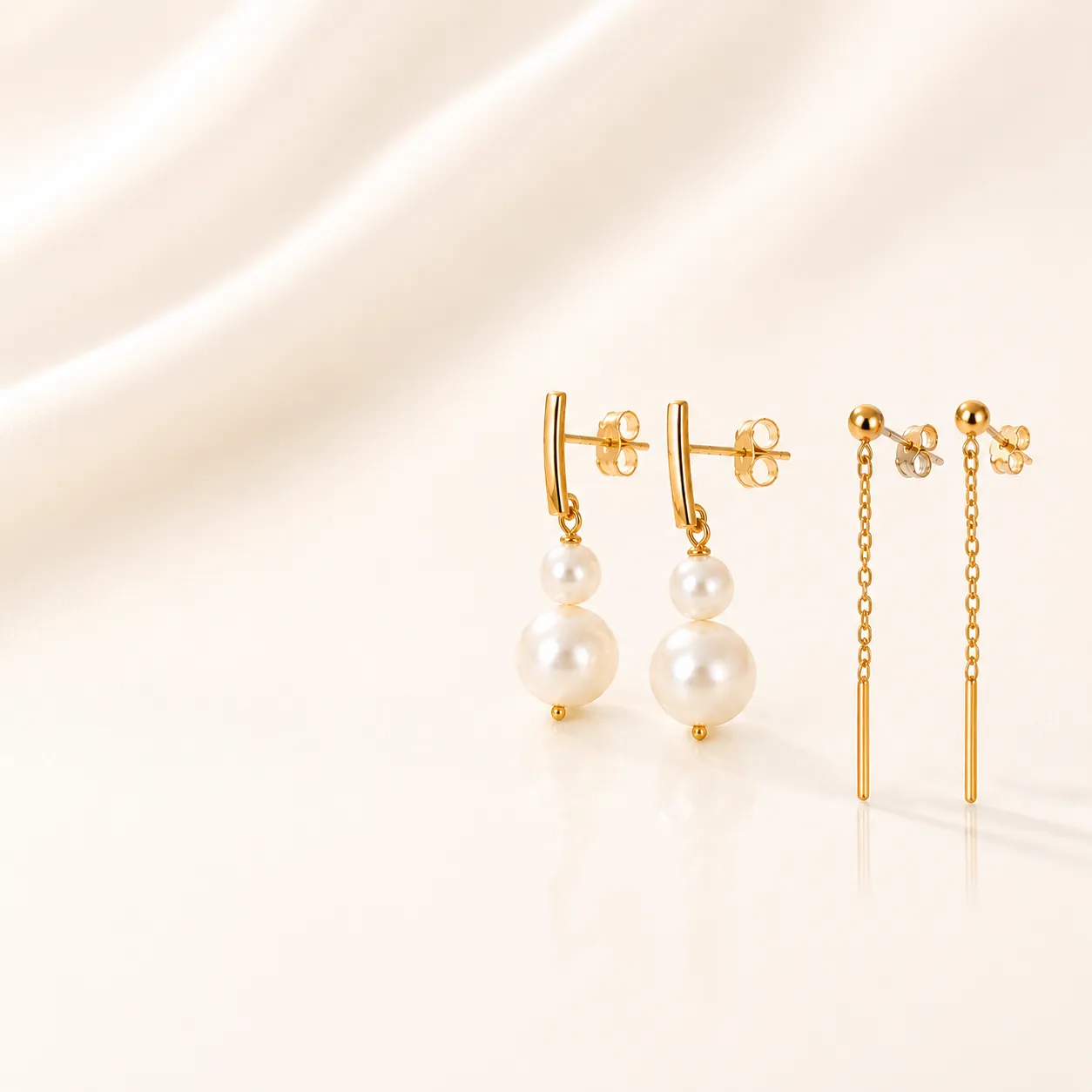 coleccion-de-pendientes-largos-en-oro-combinados-con-perlas-brillantes-en-oro-amarillo-6911 Pendientes