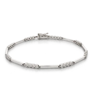 Pulsera de oro blanco con barritas lisas alternadas con grupos de diamantes redondos engastados en chatón